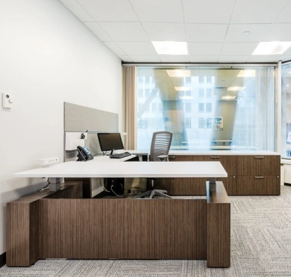 Client space with calibrate series casegoods height adjustable desk and natick seating md
