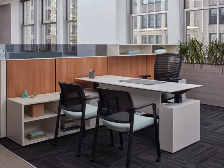 Height adjustable desk with natick task seating paxton side seating against matrix laminate panels md