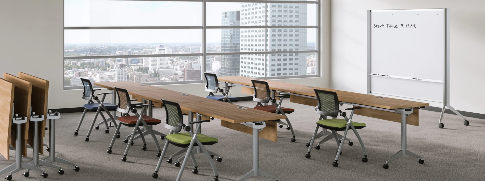 Day to day training room with flip top tables and stow seating lg