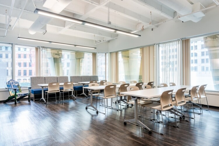 Client cafe space with day to day mobile tables lb lounge seating and triad stack seating md