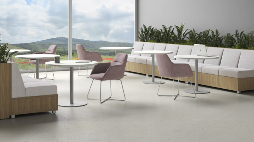 Day to day round tables with disc base in cafe setting shown with juggle and lb lounge md