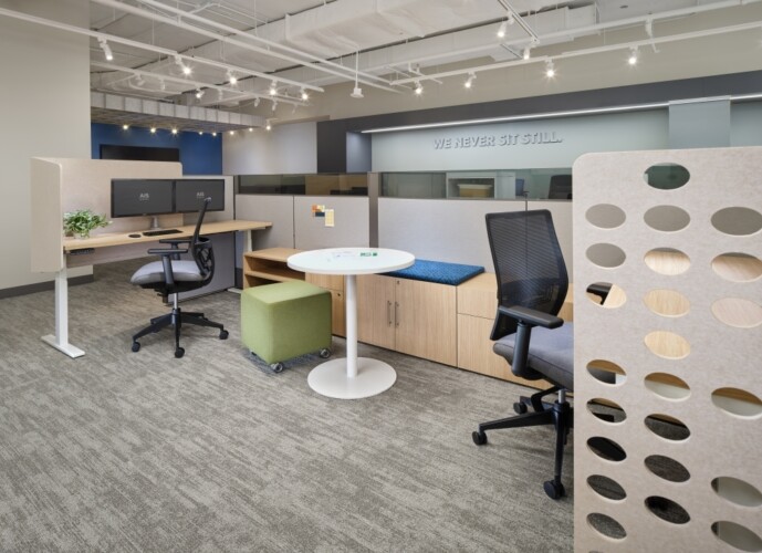 Matrix open plan offices with day to day occasional table for impromptu meetings shown with devens task seating and volker stool md