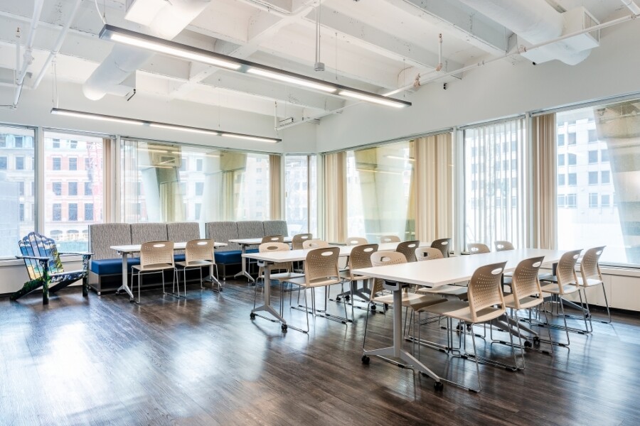 Client cafe space with day to day mobile tables lb lounge seating and triad stack seating md