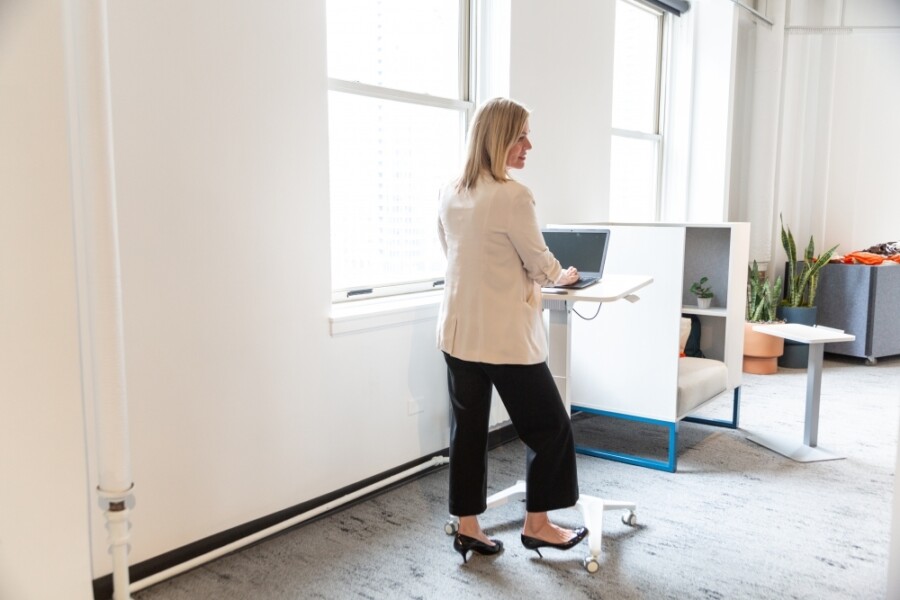 Sit to stand mobile desk in use md