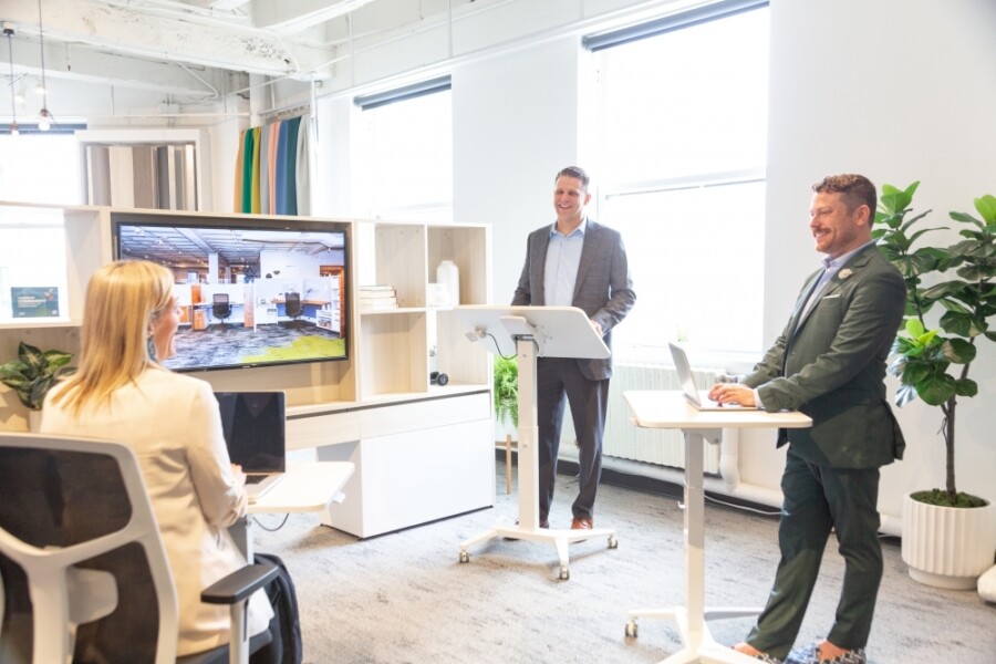 Sit to stand mobile desk neocon 2023 md